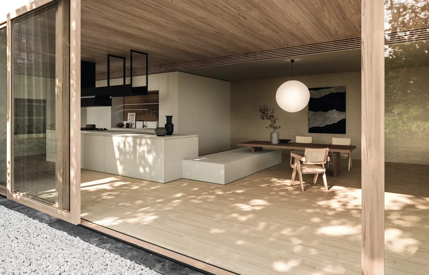 Snaidero Sistema Elementi mit heller minimalistischer Küchenzeile, Esstisch und Holzdecke in offenem Raum mit Blick in den Garten